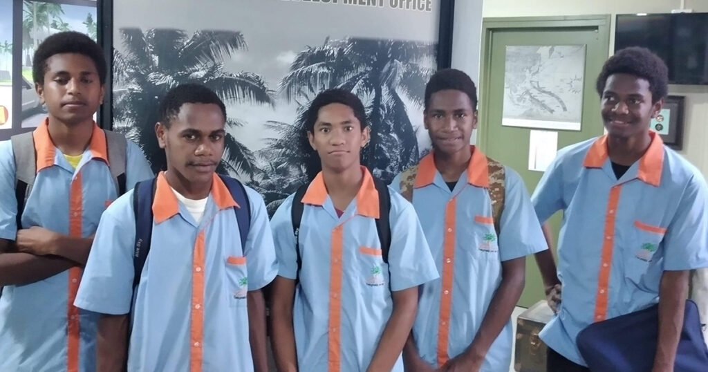 Students show growing interest in schools, posing for a photo.