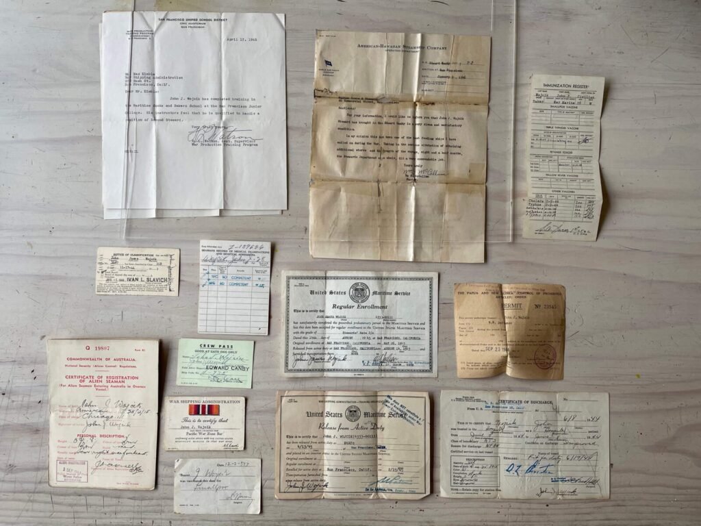 WWII draft cards, discharge papers, and registration documents